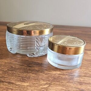 Vintage Art Deco Glass Vanity Jar Set Brass Floral Embossed Lids 2pc